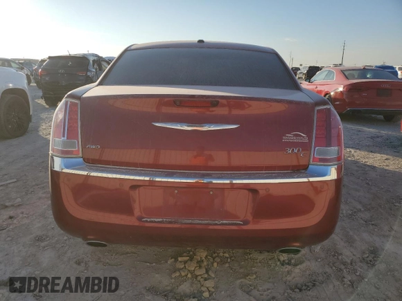2012 Chrysler 300 C with VIN 2C3CCAKT3CH197140, listed as a Copart auction lot 82628384 with 167,304 mi miles and Salvage Title. Bid and sale history available at DreamBid. Image 6.