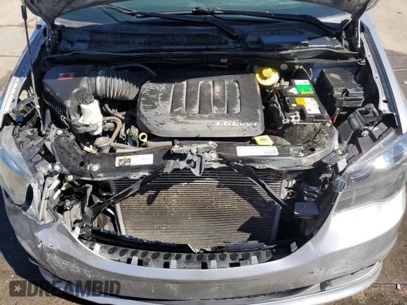 2018 Dodge Grand Caravan SXT with VIN 2C4RDGCG3JR173399, listed as a Copart auction lot 49734855 with 130,225 mi miles and Salvage Title. Bid and sale history available at DreamBid. Image 12.