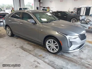 2021 Cadillac CT4 Luxury with VIN 1G6DA5RK4M0147723, listed as a IAAI auction lot 41646082 with 14,459 mi miles. Bid and sale history available at carsss.com. Image 1.