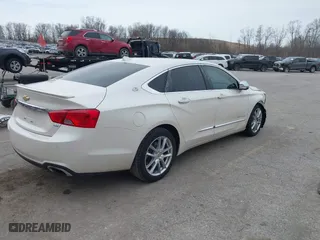 2014 Chevrolet Impala LTZ with VIN 1G1155S38EU170626, listed as a IAAI auction lot 41829108 with 137,817 mi miles. Bid and sale history available at carsss.com. Image 4.