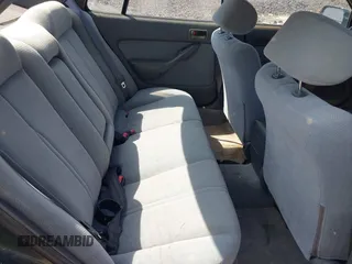 1995 Toyota Camry LE z VIN 4T1SK12E3SU576500, wystawiony jako IAAI lot #42186816 z przebiegiem 216 809 mil mil oraz . Historia ofert i sprzedaży dostępna na DreamBid. Obrazek 8.