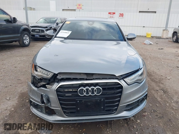 2013 Audi A6 3.0T Prestige with VIN WAUHGAFC3DN131239, listed as a IAAI auction lot 41168869 with 134,628 mi miles. Bid and sale history available at carsss.com. Image 11.
