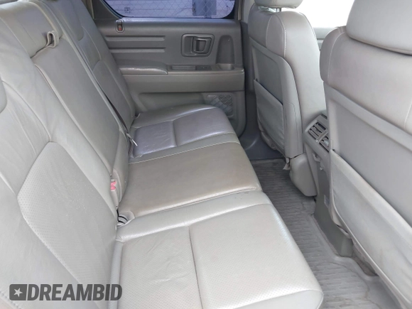 2007 Honda Ridgeline RTL with VIN 2HJYK16577H537990, listed as a IAAI auction lot 42454619 with 182,911 mi miles and . Bid and sale history available at DreamBid. Image 8.