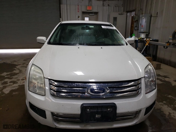 2008 Ford Fusion SE with VIN 3FAHP07128R211568, listed as a Copart auction lot 74850334 with 153,710 mi miles and Salvage Title. Bid and sale history available at carsss.com. Image 5.