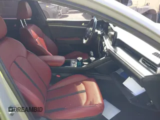 2023 Kia K5 GT-Line z VIN 5XXG64J25PG181772, wystawiony jako IAAI lot #42283124 z przebiegiem 40 857 mil mil oraz . Historia ofert i sprzedaży dostępna na DreamBid. Obrazek 5.