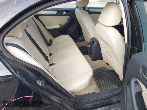 2012 Volkswagen Jetta Sedan SE w/Convenience with VIN 3VWDX7AJ5CM398348, listed as a IAAI auction lot 41708085 with 147,477 mi miles. Bid and sale history available at carsss.com. Image 8.