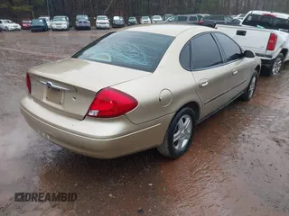 2000 Ford Taurus SEL with VIN 1FAFP56S0YA168888, listed as a IAAI auction lot 41555916 with 170,672 mi miles and . Bid and sale history available at DreamBid. Image 4.