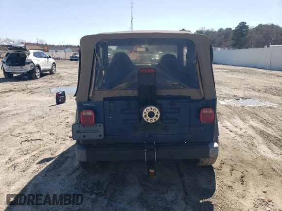 2002 Jeep Wrangler X with VIN 1J4FA39S82P735388, listed as a Copart auction lot 49511065 with 213,957 mi miles and Clean Title. Bid and sale history available at carsss.com. Image 6.