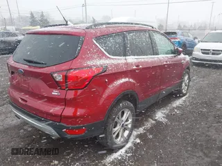 2019 Ford Escape SEL with VIN 1FMCU9HD2KUB22976, listed as a IAAI auction lot 41898421 with 19,471 mi miles. Bid and sale history available at carsss.com. Image 4.
