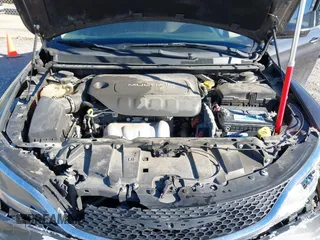 2015 Chrysler 200 Limited with VIN 1C3CCCABXFN653344, listed as a IAAI auction lot 41806428 with 198,835 mi miles. Bid and sale history available at carsss.com. Image 10.