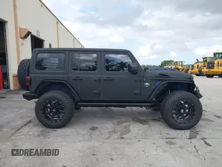 2018 Jeep Wrangler Unlimited Sport S z VIN 1C4HJXDG2JW228483, wystawiony jako IAAI lot #41710364 z przebiegiem 56 970 mil mil oraz . Historia ofert i sprzedaży dostępna na DreamBid. Obrazek 13.