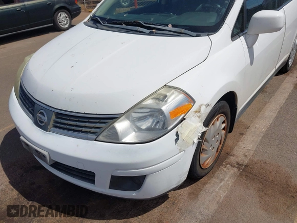 2009 Nissan Versa 1.8 S with VIN 3N1BC11E99L371998, listed as a IAAI auction lot 41723771 with 130,172 mi miles. Bid and sale history available at carsss.com. Image 6.