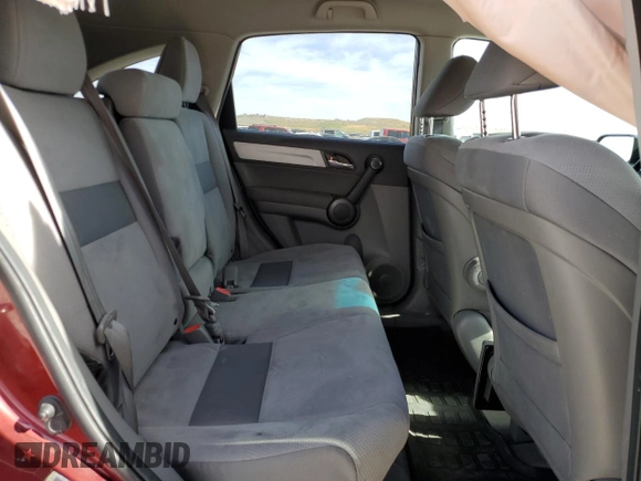 2011 Honda CR-V SE z VIN JHLRE4H49BC014216, wystawiony jako Copart lot #56607785 z przebiegiem 143 006 mil mil oraz Szkoda całkowita • Salvage title. Historia ofert i sprzedaży dostępna na DreamBid. Obrazek 10.