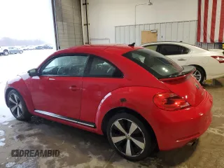 2012 Volkswagen Beetle 2.0T Black Turbo Launch Edition PZEV with VIN 3VWVA7AT8CM607203, listed as a Copart auction lot 47852705 with 119,477 mi miles and Clean Title. Bid and sale history available at carsss.com. Image 2.