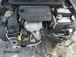 2014 Dodge Dart SXT z VIN 1C3CDFBB7ED721312, wystawiony jako Copart lot #56559775 z przebiegiem 131 810 mil mil oraz Szkoda całkowita • Salvage title. Historia ofert i sprzedaży dostępna na DreamBid. Obrazek 11.