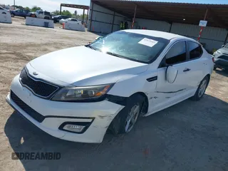 2014 Kia Optima LX with VIN 5XXGM4A70EG307809, listed as a IAAI auction lot 42023169 with 127,617 mi miles. Bid and sale history available at carsss.com. Image 2.