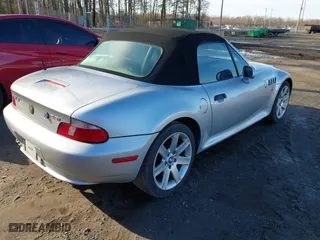 2001 BMW Z3 2.5i with VIN WBACN33461LM03363, listed as a IAAI auction lot 41883292 with 184,957 mi miles. Bid and sale history available at carsss.com. Image 4.