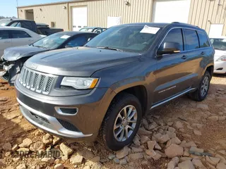 2015 Jeep Grand Cherokee Summit with VIN 1C4RJFJG8FC679185, listed as a IAAI auction lot 41653531 with 158,186 mi miles and . Bid and sale history available at DreamBid. Image 2.