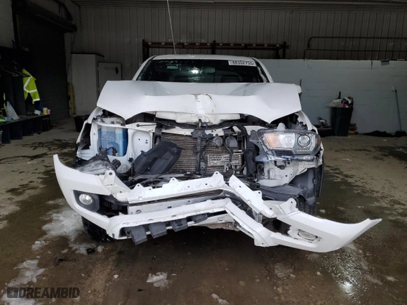 2020 Toyota Tacoma 4WD SR5 with VIN 3TMCZ5AN5LM325643, listed as a Copart auction lot 88352755 with 115,234 mi miles and Salvage Title. Bid and sale history available at carsss.com. Image 5.