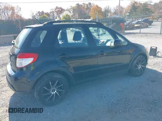 2013 Suzuki SX4 Crossover with VIN JS2YB5A32D6100600, listed as a IAAI auction lot 40667095 with 192,636 mi miles. Bid and sale history available at carsss.com. Image 4.
