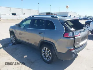 2019 Jeep Cherokee Latitude Plus with VIN 1C4PJMLBXKD233749, listed as a IAAI auction lot 41937698 with 103,988 mi miles and . Bid and sale history available at DreamBid. Image 3.