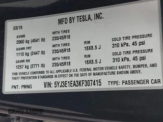 2019 Tesla Model 3 Mid Range with VIN 5YJ3E1EA3KF307415, listed as a IAAI auction lot 41673239 with 42,895 mi miles and . Bid and sale history available at DreamBid. Image 9.