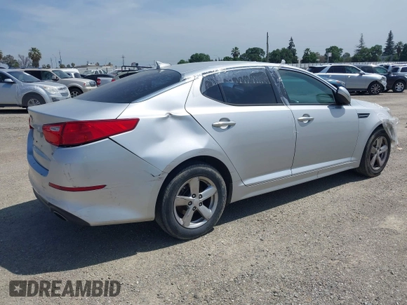2015 Kia Optima LX with VIN 5XXGM4A74FG381316, listed as a IAAI auction lot 41885940 with 128,984 mi miles. Bid and sale history available at carsss.com. Image 4.