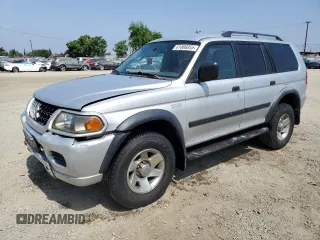 2003 Mitsubishi Montero ES z VIN JA4LS21H93J042456, wystawiony jako Copart lot #61086055 z przebiegiem Nie podano mil oraz Czysty tytuł • Clean title. Historia ofert i sprzedaży dostępna na DreamBid. Obrazek 1.