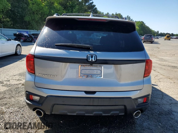 2022 Honda Passport EX-L z VIN 5FNYF7H59NB003482, wystawiony jako Copart lot #55460425 z przebiegiem 32 321 mil mil oraz Szkoda całkowita • Salvage title. Historia ofert i sprzedaży dostępna na DreamBid. Obrazek 6.