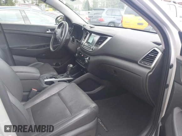 2017 Hyundai Tucson Sport z VIN KM8J33A29HU351910, wystawiony jako IAAI lot #42281390 z przebiegiem 110 522 mil mil oraz . Historia ofert i sprzedaży dostępna na DreamBid. Obrazek 5.