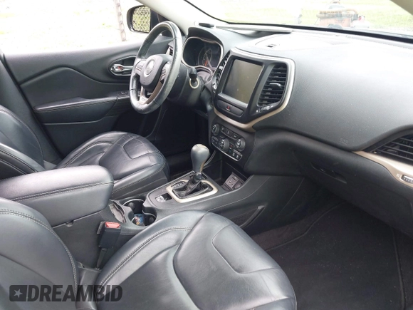 2016 Jeep Cherokee Limited with VIN 1C4PJLDBXGW211996, listed as a IAAI auction lot 42465945 with 153,067 mi miles and . Bid and sale history available at DreamBid. Image 5.