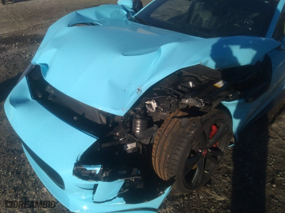 2016 Jaguar F-TYPE R with VIN SAJWJ6DL2GMK24146, listed as a IAAI auction lot 41237675 with 91,365 mi miles. Bid and sale history available at carsss.com. Image 6.