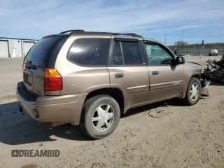 2003 GMC Envoy SLT z VIN 1GKDS13S032134647, wystawiony jako Copart lot #50137325 z przebiegiem 217 878 mil mil oraz Szkody całkowita. Historia ofert i sprzedaży dostępna na DreamBid. Obrazek 3.