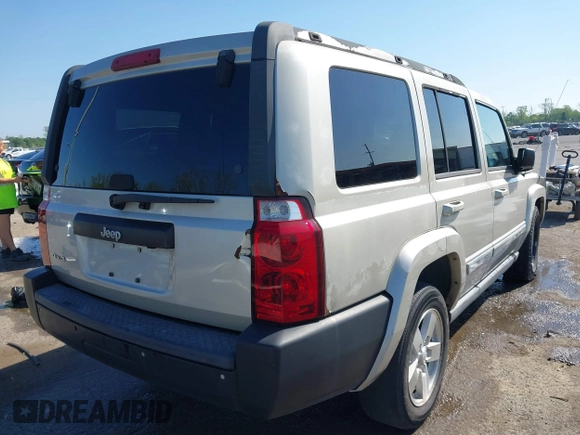 2007 Jeep Commander Sport z VIN 1J8HG48K07C559271, wystawiony jako IAAI lot #42032853 z przebiegiem 236 443 mil mil oraz . Historia ofert i sprzedaży dostępna na DreamBid. Obrazek 4.