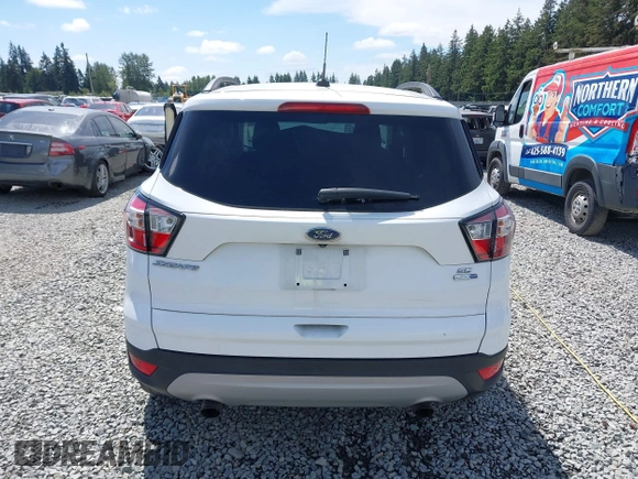 2018 Ford Escape SE z VIN 1FMCU9GD6JUB45046, wystawiony jako IAAI lot #42314262 z przebiegiem 107 962 mil mil oraz . Historia ofert i sprzedaży dostępna na DreamBid. Obrazek 17.