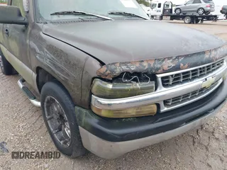1999 Chevrolet Silverado 1500 with VIN 1GCEC14W0XZ170429, listed as a IAAI auction lot 41910557 with 301,746 mi miles. Bid and sale history available at carsss.com. Image 6.