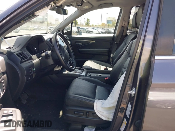 2021 Honda Pilot EX-L with VIN 5FNYF5H57MB046740, listed as a IAAI auction lot 41943366 with 31,198 mi miles and . Bid and sale history available at DreamBid. Image 5.