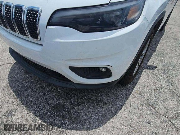2019 Jeep Cherokee Altitude with VIN 1C4PJMLX6KD361465, listed as a IAAI auction lot 42730449 with 116,730 mi miles and . Bid and sale history available at DreamBid. Image 12.