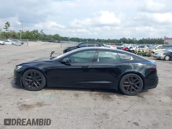2023 Tesla Model S с VIN 5YJSA1E59PF502078, выставлен на аукционе IAAI как лот 41766041 с пробегом 26 546 миль миль и . История ставок и продаж доступна на DreamBid. Изображение 13.