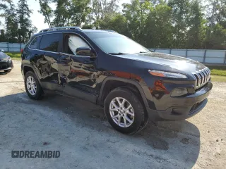 2018 Jeep Cherokee Latitude Tech Connect with VIN 1C4PJMCX7JD500971, listed as a Copart auction lot 57604465 with 133,293 mi miles and Salvage title. Bid and sale history available at DreamBid. Image 4.