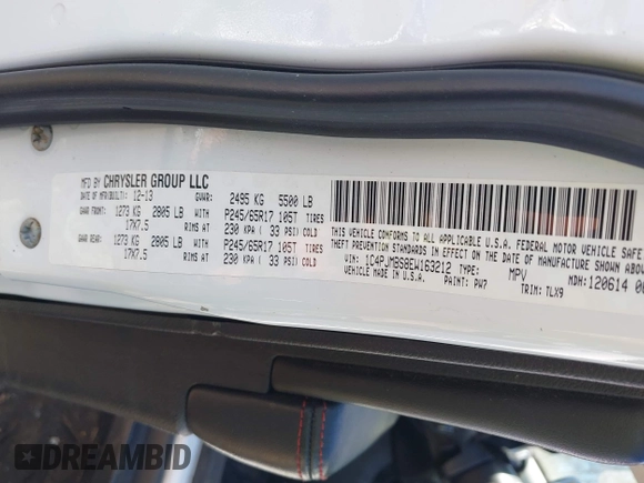 2014 Jeep Cherokee Trailhawk with VIN 1C4PJMBS8EW163212, listed as a IAAI auction lot 42124107 with 114,999 mi miles. Bid and sale history available at carsss.com. Image 9.