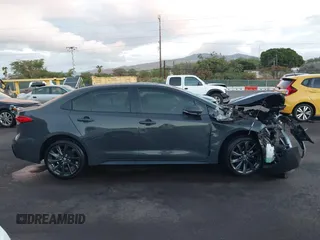 2024 Toyota Corolla SE z VIN JTDP4MCE9R3522624, wystawiony jako IAAI lot #40741101 z przebiegiem 4231 mil mil oraz . Historia ofert i sprzedaży dostępna na DreamBid. Obrazek 14.
