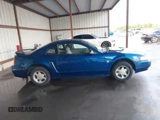 1999 Ford Mustang with VIN 1FAFP4040XF124637, listed as a IAAI auction lot 41793662 with 54,591 mi miles and . Bid and sale history available at DreamBid. Image 13.