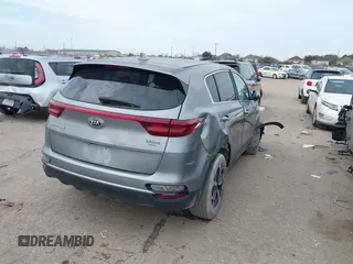 2020 Kia Sportage LX with VIN KNDPM3AC5L7720838, listed as a IAAI auction lot 41458808 with 52,689 mi miles and . Bid and sale history available at DreamBid. Image 4.
