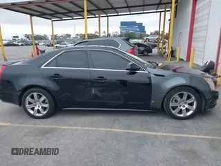 2011 Cadillac CTS Luxury with VIN 1G6DF5EYXB0103430, listed as a IAAI auction lot 42105337 with 205,069 mi miles and . Bid and sale history available at DreamBid. Image 13.