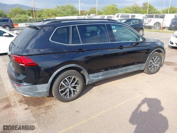 2019 Volkswagen Tiguan SE with VIN 3VV3B7AXXKM012766, listed as a IAAI auction lot 41571347 with 56,594 mi miles. Bid and sale history available at carsss.com. Image 4.