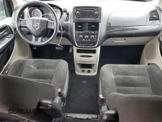 2015 Dodge Grand Caravan SE with VIN 2C4RDGBG0FR702106, listed as a Copart auction lot 54595205 with 209,319 mi miles and Salvage Title. Bid and sale history available at DreamBid. Image 8.