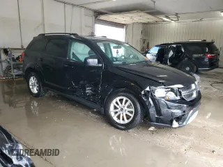 2015 Dodge Journey SXT with VIN 3C4PDDBG7FT646152, listed as a Copart auction lot 58371505 with 143,759 mi miles and Salvage title. Bid and sale history available at DreamBid. Image 4.
