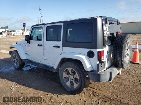 2016 Jeep Wrangler Unlimited Sahara with VIN 1C4BJWEG6GL301301, listed as a Copart auction lot 54362595 with 110,295 mi miles and Salvage title. Bid and sale history available at DreamBid. Image 2.