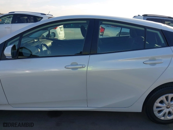 2021 Toyota Prius L Eco with VIN JTDKAMFU7M3133544, listed as a IAAI auction lot 41548653 with 115,214 mi miles. Bid and sale history available at carsss.com. Image 15.